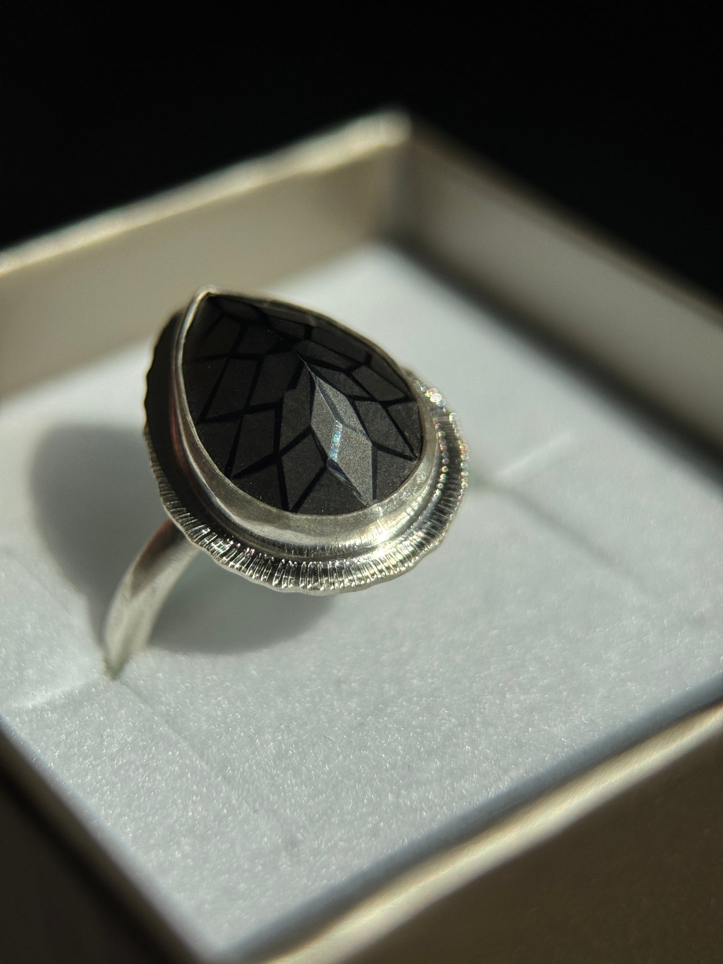 Laser cut black Spinel ring