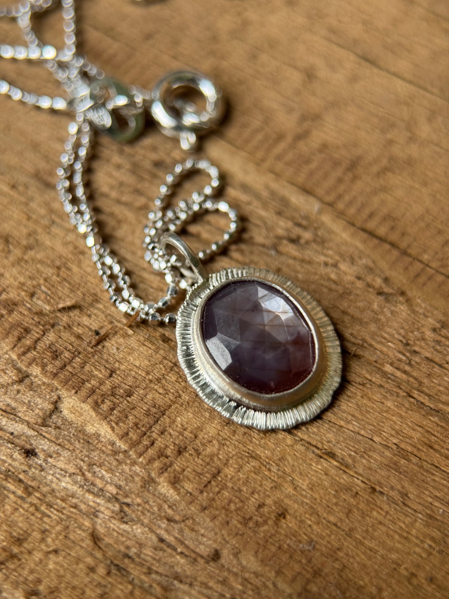 Rose cut silky plum Sapphire pendant