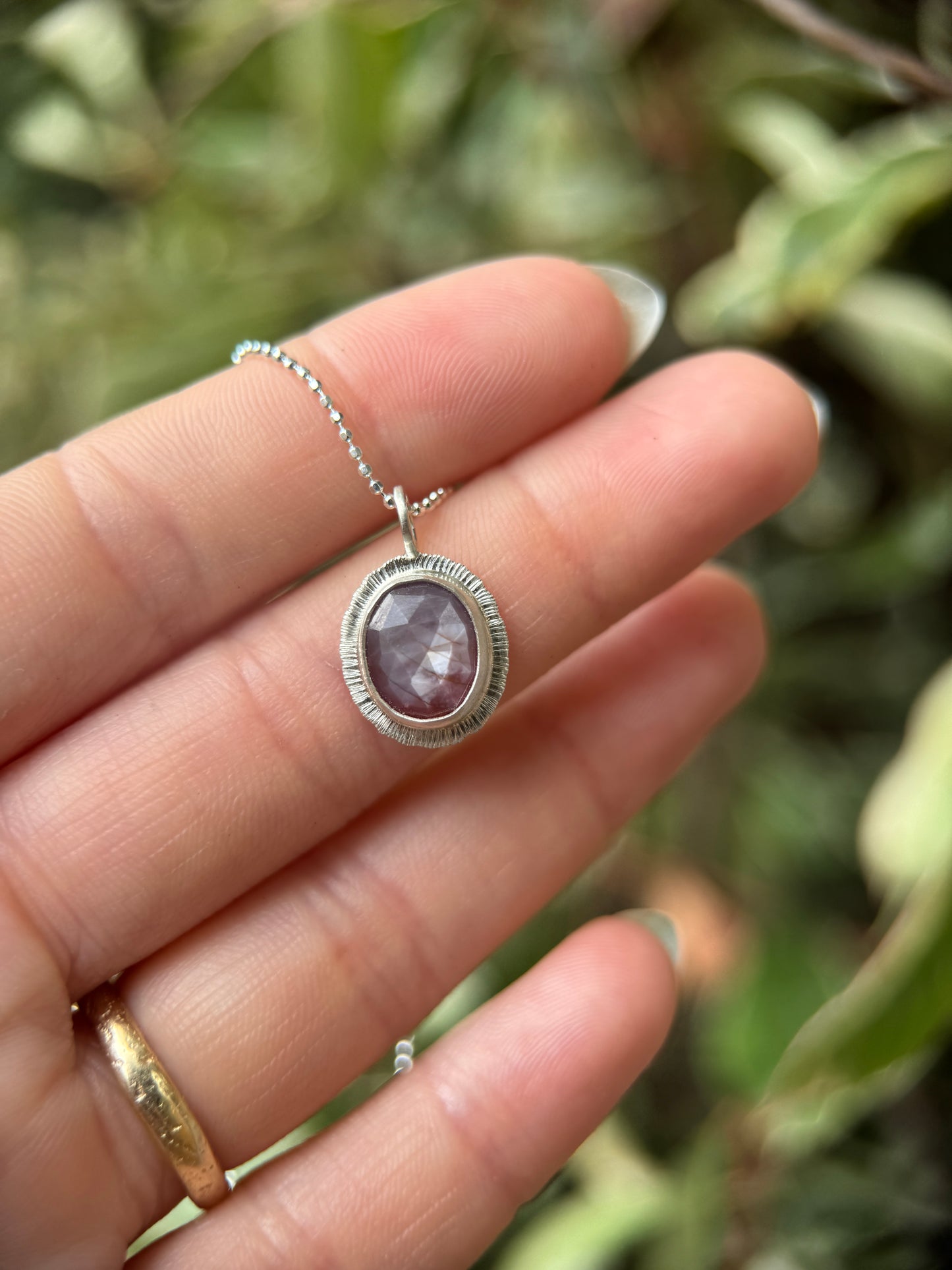 Rose cut silky plum Sapphire pendant
