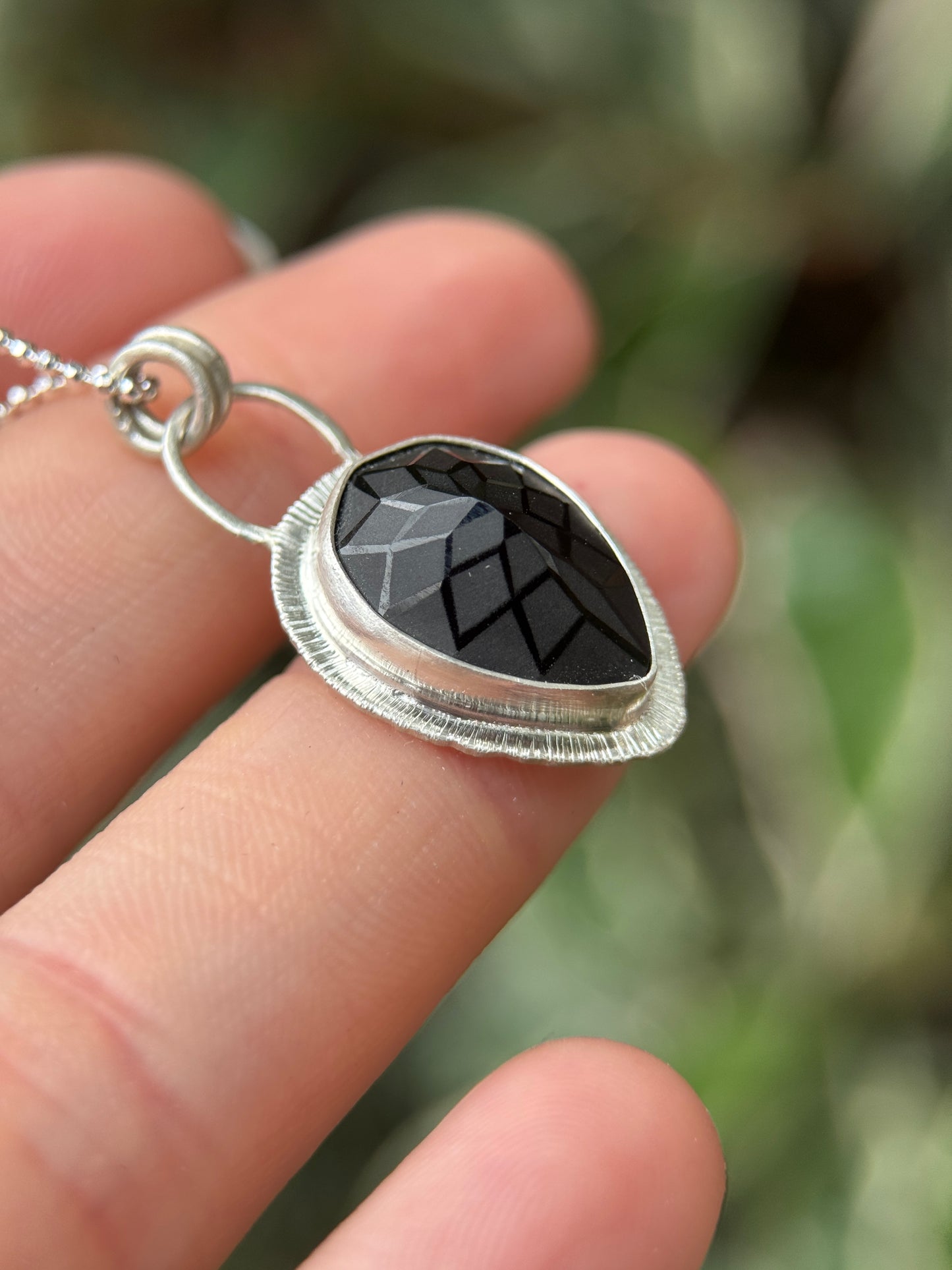 Laser carved black Spinel pendant