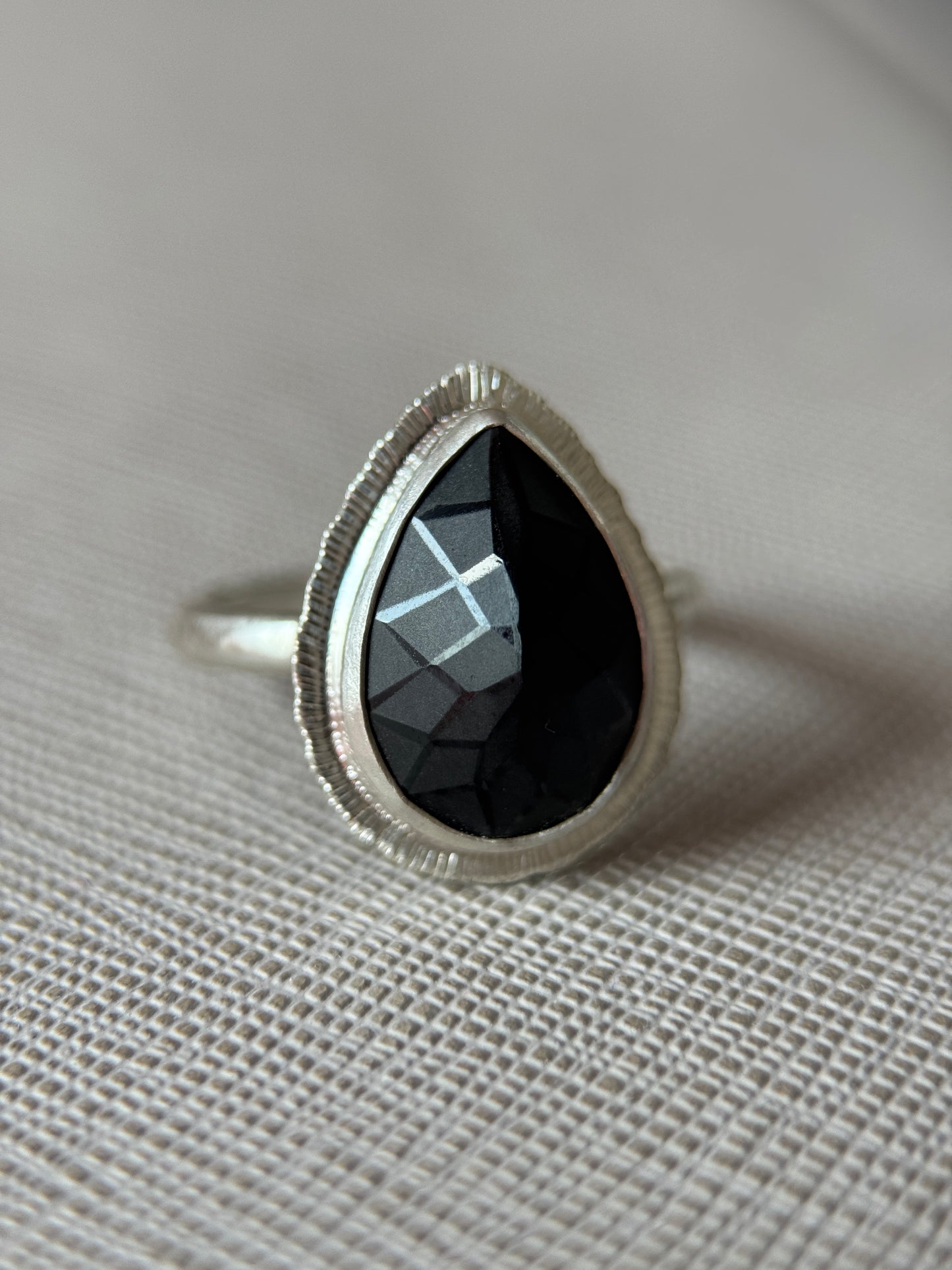 Laser cut black Spinel ring