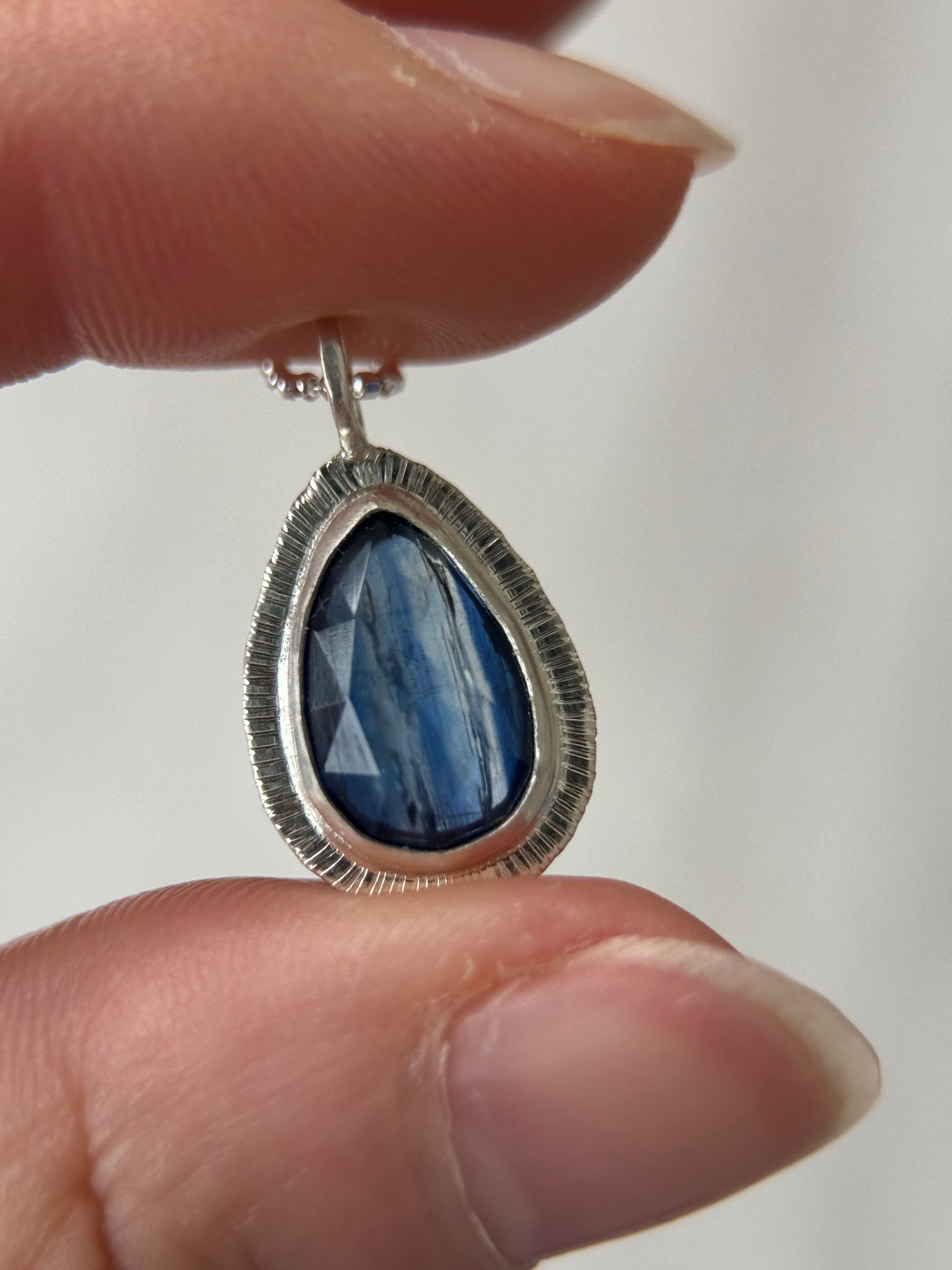 Rose cut blue Kyanite pendant