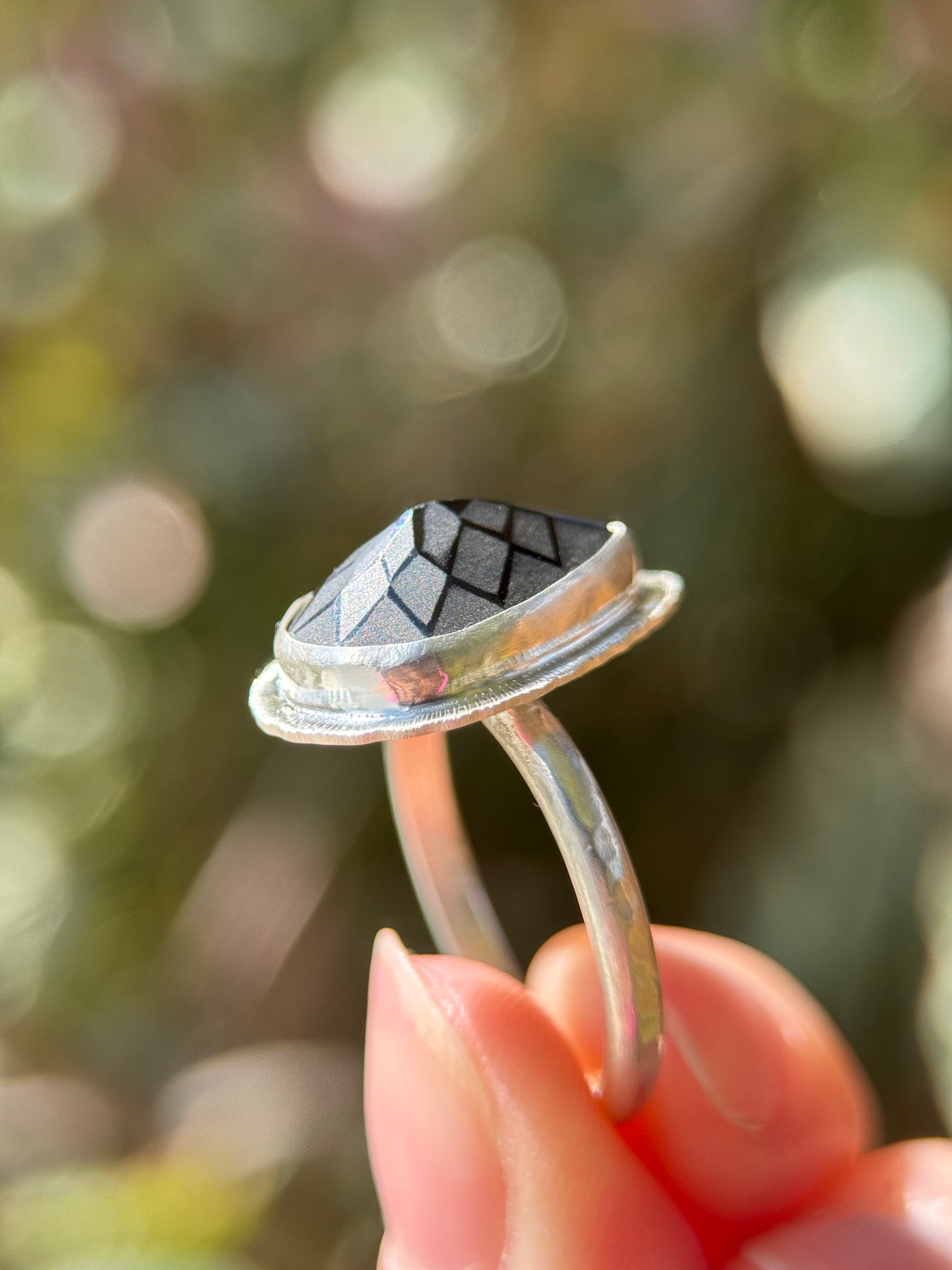 Laser cut black Spinel ring