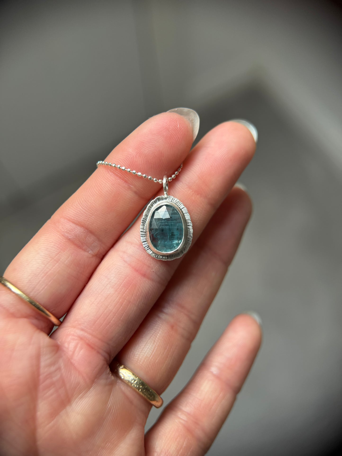 Rose cut neon Kyanite pendant