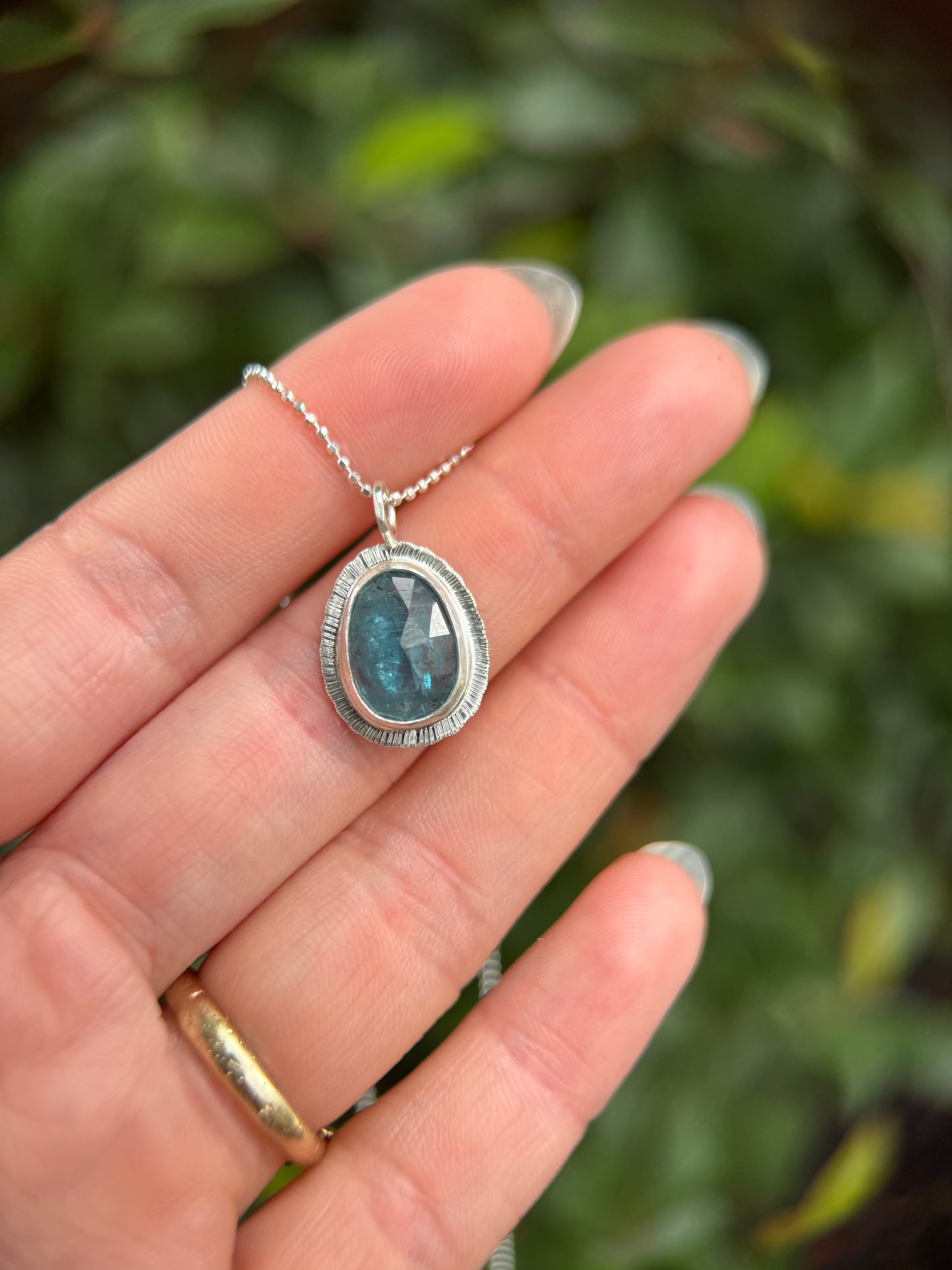 Rose cut neon Kyanite pendant