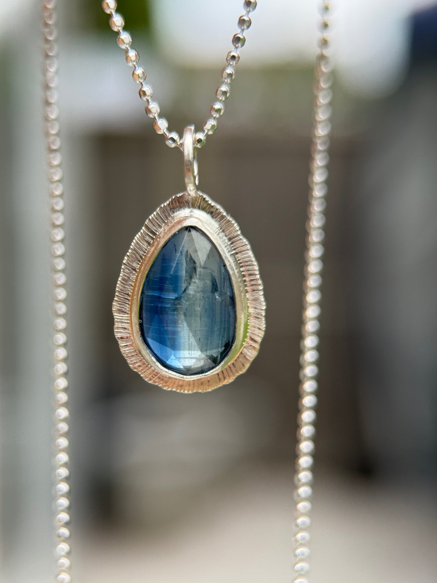 Rose cut blue Kyanite pendant