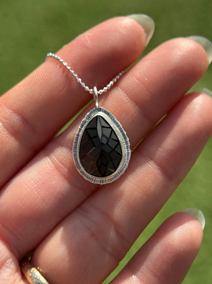 Laser carved black Spinel pendant