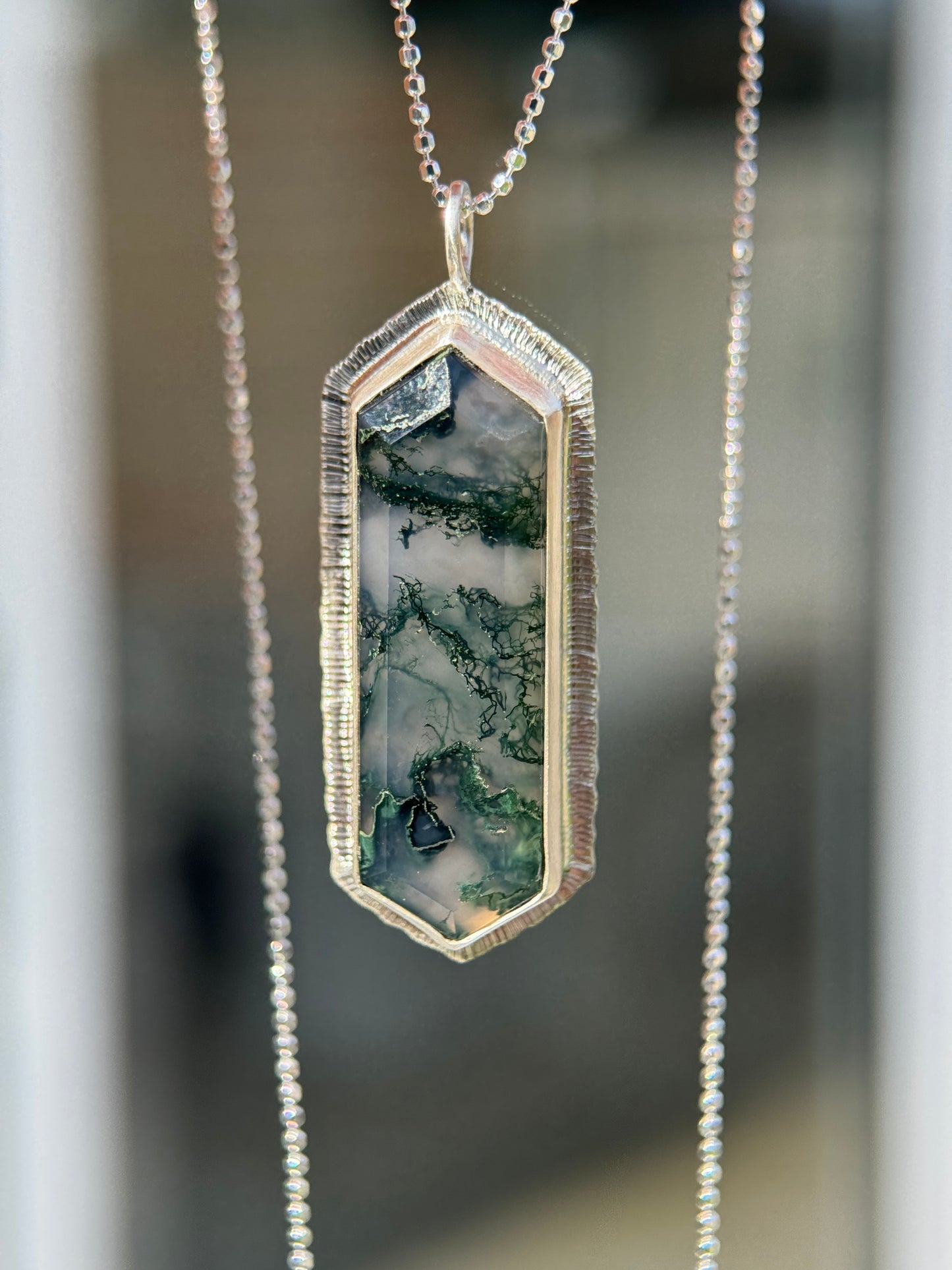 Step cut elongated hexagon Moss Agate pendant