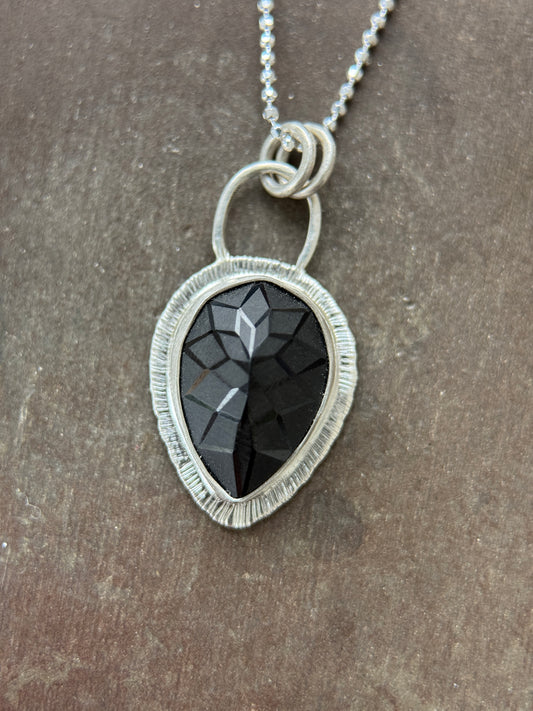 Laser carved black Spinel pendant