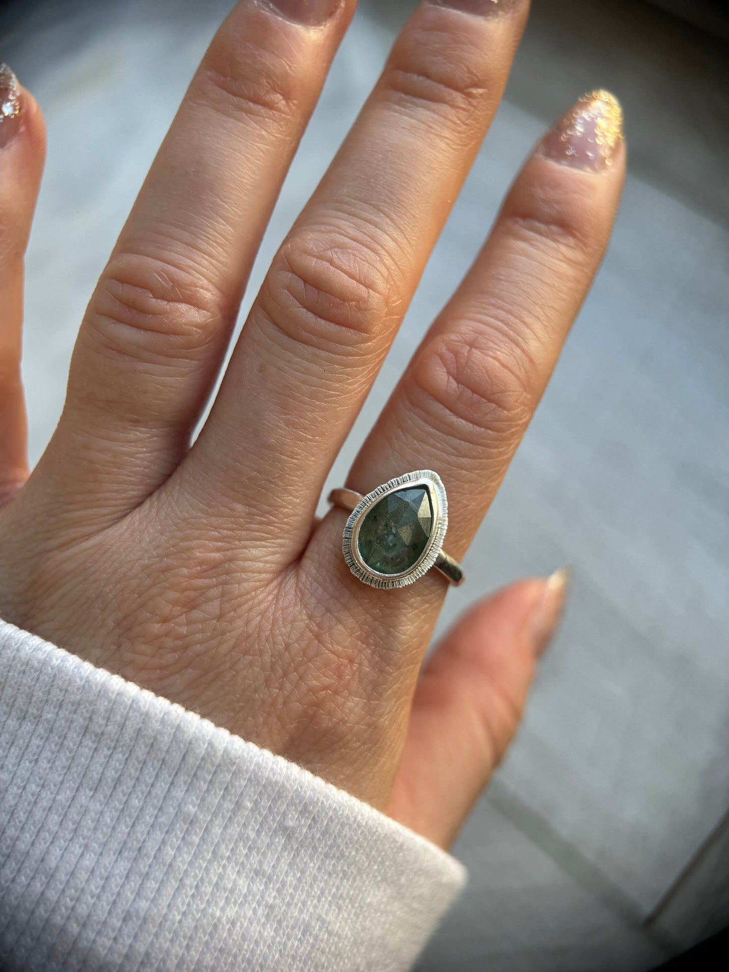 Rose cut Green Kyanite ring, natural emerald colour teardrop gemstone, open back, bezel set, sterling silver, calming crystal jewellery