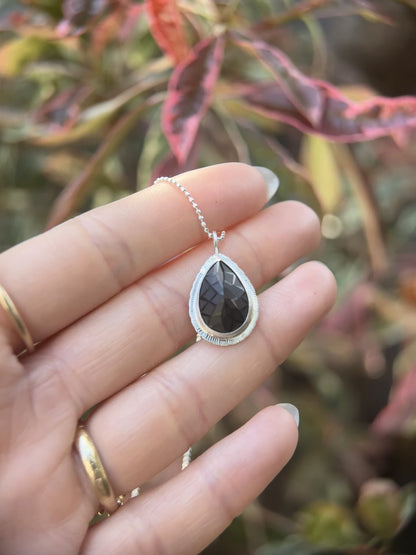 Laser carved black Spinel pendant